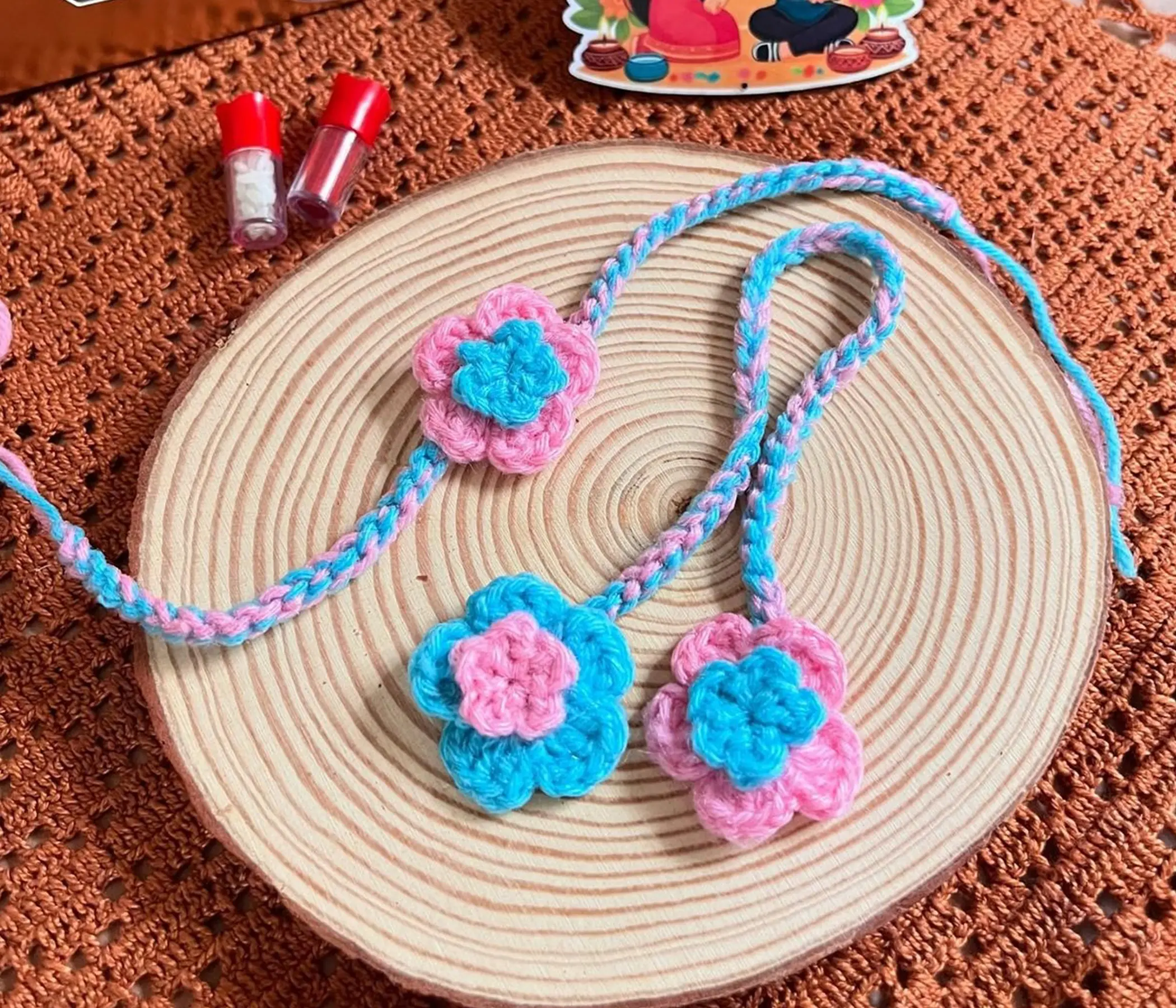 Pastel Blooms: Hand-Crocheted Bhaiya-Bhabhi Rakhi Set